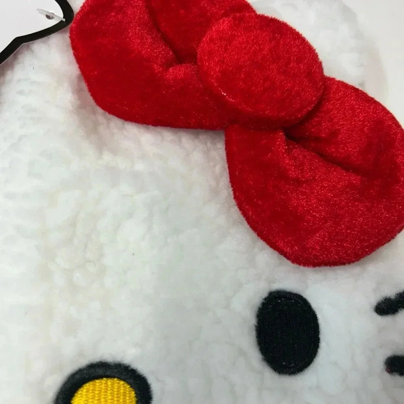 White hello Kitty hat, Sherpa outside red bow, braided tassels on the side - Picture 2 of 5